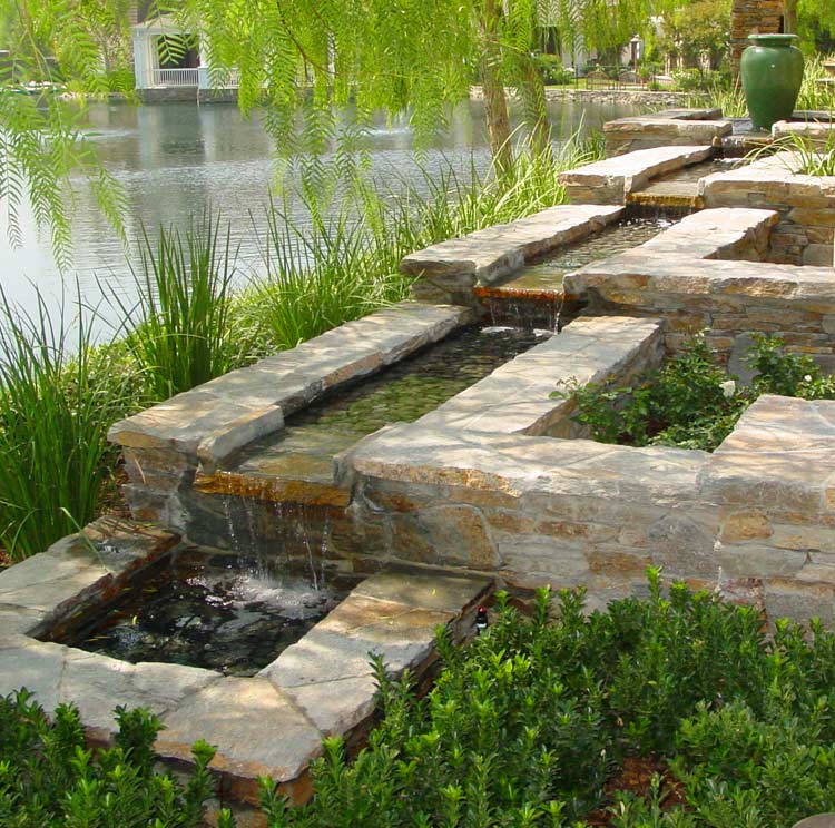 Estate fountain with river rock feature