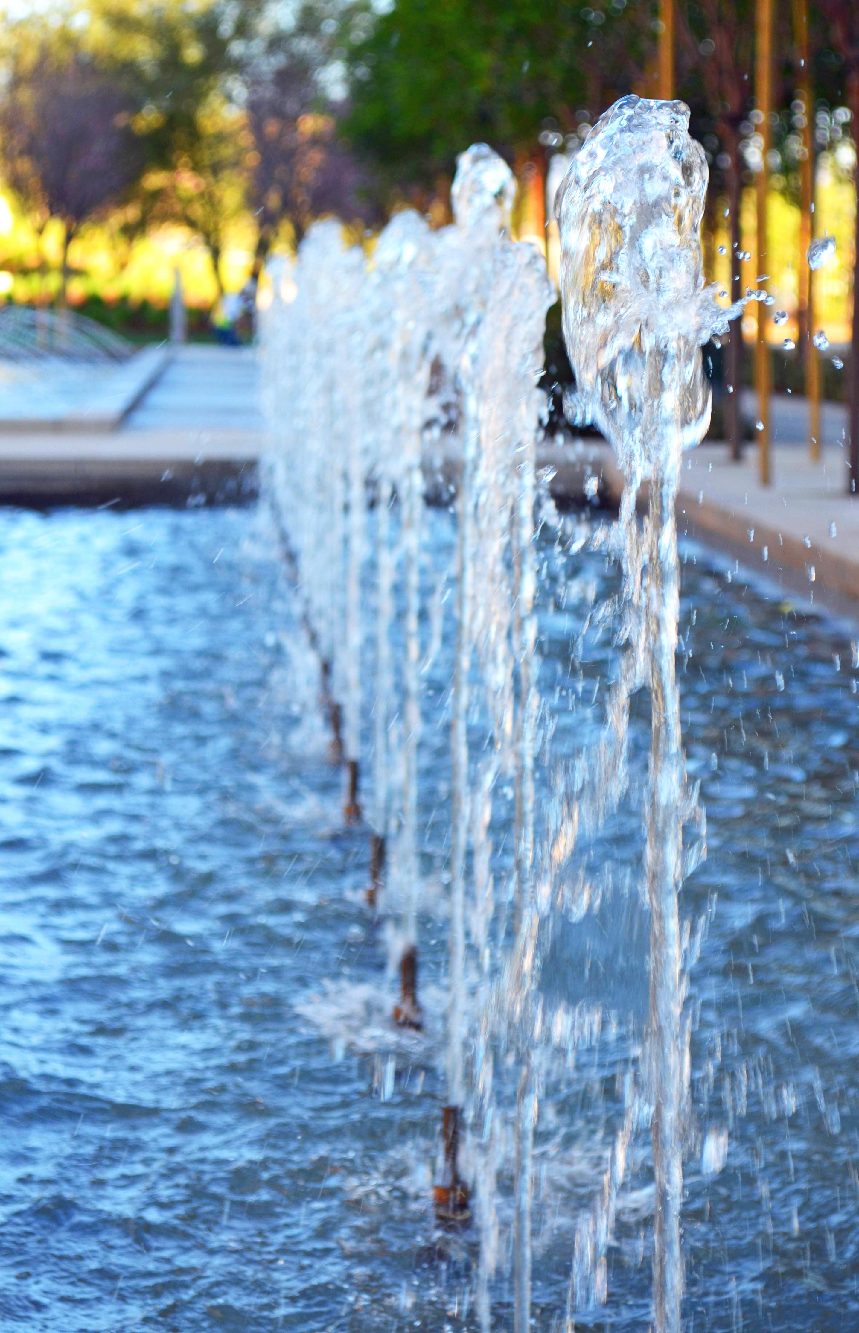 Healthcare facility fountain with water jets close up view