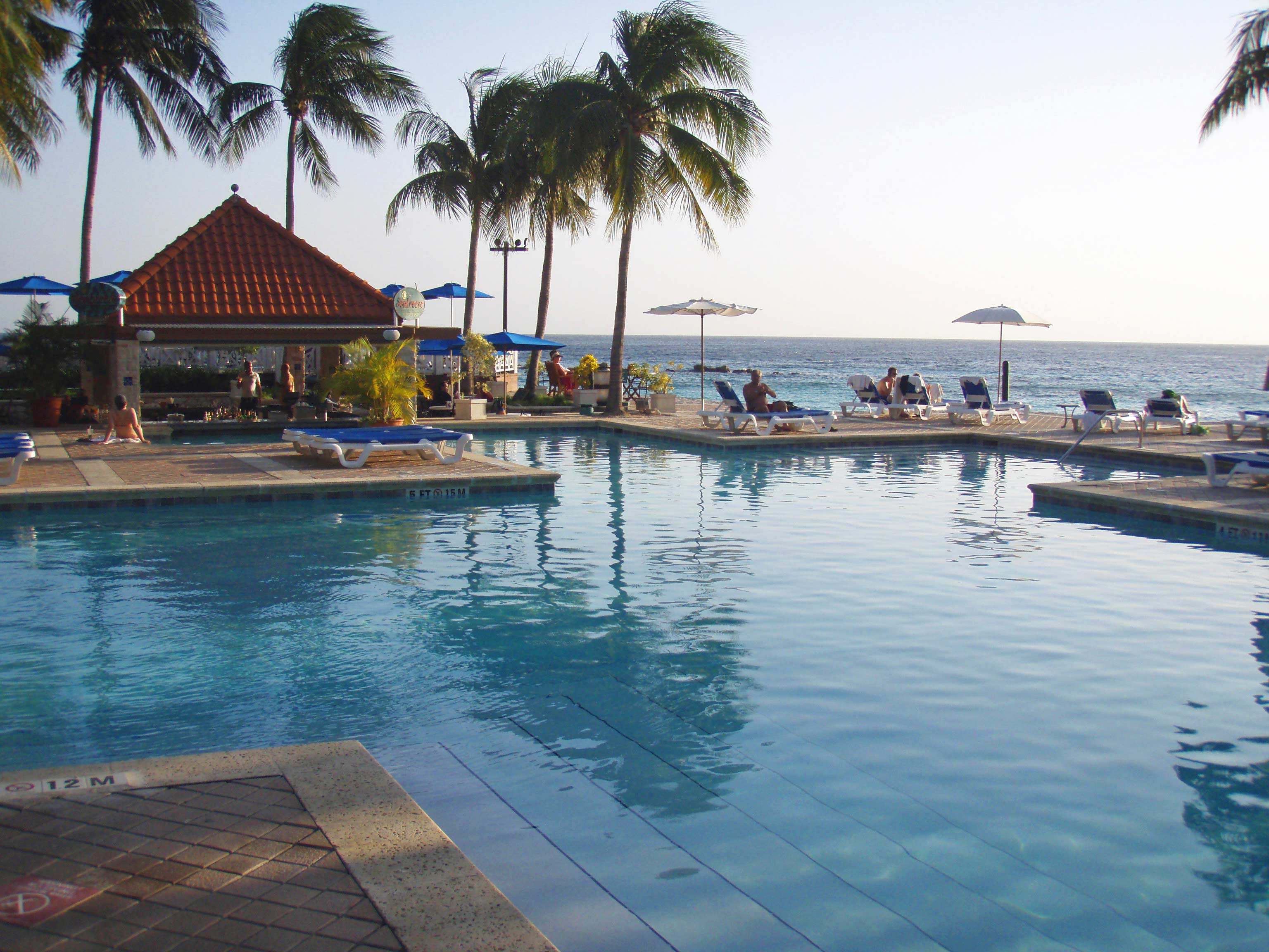 Hospitaltiy and Resort pool with ocean view