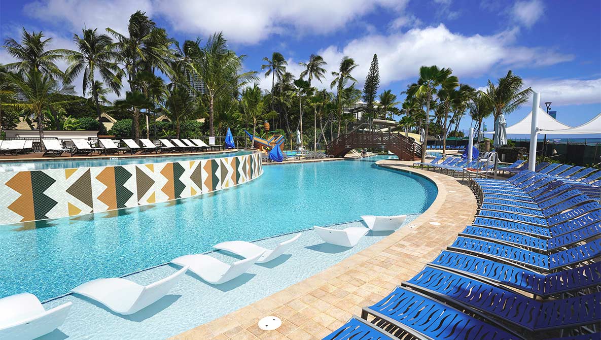 Hospitaltiy and Resort Pool Beachside View with Chairs